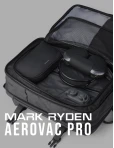 Mark Ryden Aerovac Pro Black open inside a backpack, product name overlay